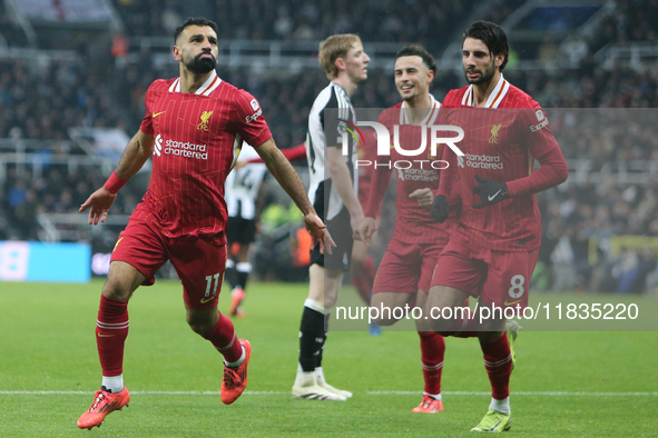 Liverpool's Mohamed Salah celebrates his goal during the Premier League match between Newcastle United and Liverpool at St. James's Park in...