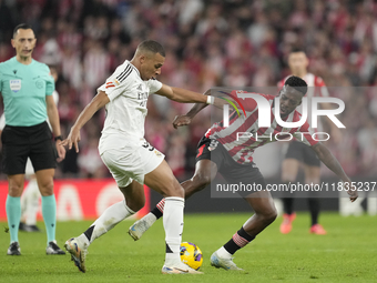 Kylian Mbappe centre-forward of Real Madrid and France and Inaki Williams right winger of Athletic Club and Ghana compete for the ball durin...