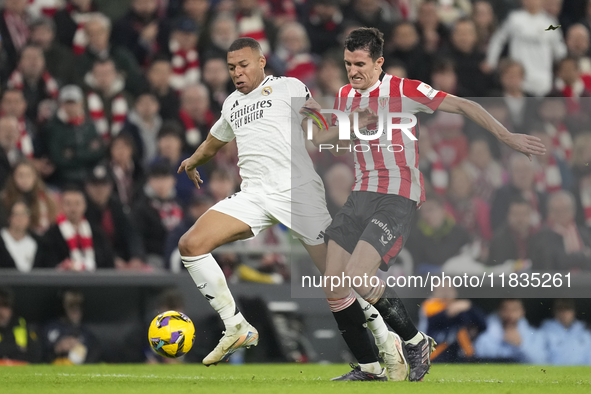 Kylian Mbappe centre-forward of Real Madrid and France and Dani Vivian centre-back of Athletic Club and Spain compete for the ball during th...