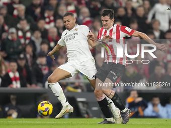 Kylian Mbappe centre-forward of Real Madrid and France and Dani Vivian centre-back of Athletic Club and Spain compete for the ball during th...