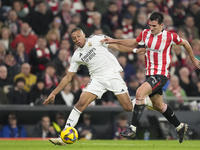 Kylian Mbappe centre-forward of Real Madrid and France and Dani Vivian centre-back of Athletic Club and Spain compete for the ball during th...