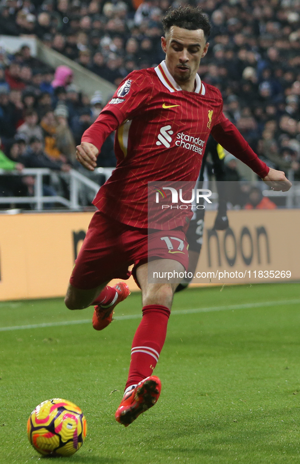 Liverpool's Curtis Jones participates in the Premier League match between Newcastle United and Liverpool at St. James's Park in Newcastle, U...