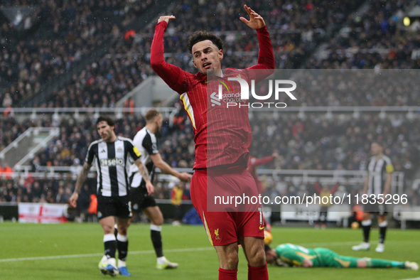 Liverpool's Curtis Jones celebrates Liverpool's first goal during the Premier League match between Newcastle United and Liverpool at St. Jam...