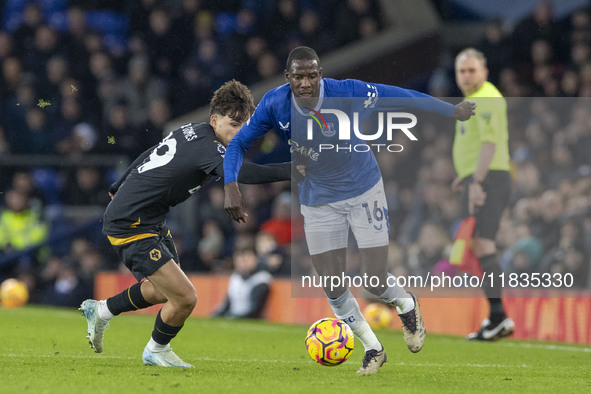 Abdoulaye Doucoure #16 of Everton F.C. goes past the opponent during the Premier League match between Everton and Wolverhampton Wanderers at...