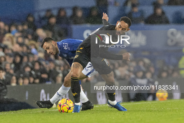 Dwight McNeil #7 of Everton F.C. takes on Matheus Cunha #10 of Wolverhampton Wanderers F.C. during the Premier League match between Everton...