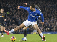 Iliman Ndiaye #10 of Everton F.C. is tackled by the opponent during the Premier League match between Everton and Wolverhampton Wanderers at...