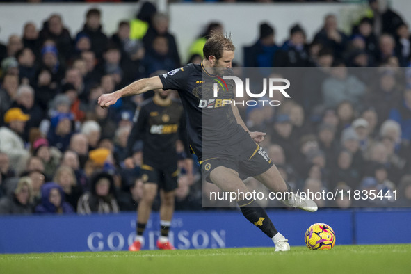 Craig Dawson #15 of Wolverhampton Wanderers F.C. is in action during the Premier League match between Everton and Wolverhampton Wanderers at...