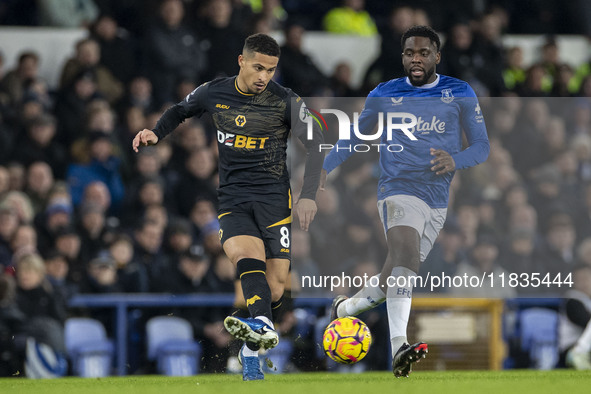 Joao Gomes #8 of Wolverhampton Wanderers F.C. is in action during the Premier League match between Everton and Wolverhampton Wanderers at Go...