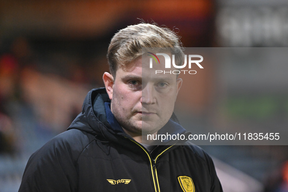 Interim Manager Tom Hounsell observes during the Sky Bet League 1 match between Peterborough United and Burton Albion at the Weston Homes St...