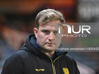 Interim Manager Tom Hounsell observes during the Sky Bet League 1 match between Peterborough United and Burton Albion at the Weston Homes St...