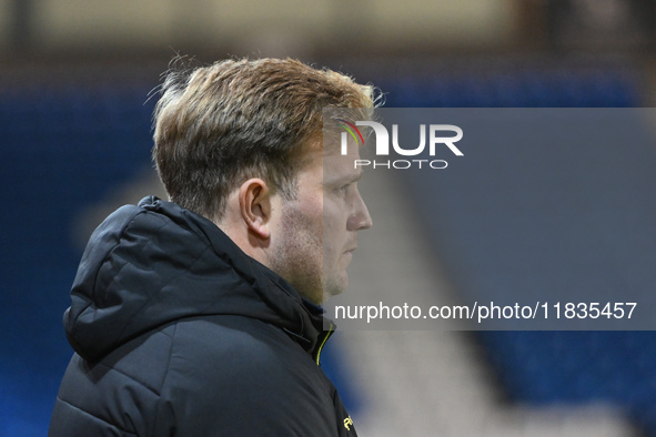 Interim Manager Tom Hounsell observes during the Sky Bet League 1 match between Peterborough United and Burton Albion at the Weston Homes St...