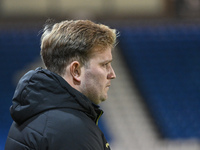 Interim Manager Tom Hounsell observes during the Sky Bet League 1 match between Peterborough United and Burton Albion at the Weston Homes St...