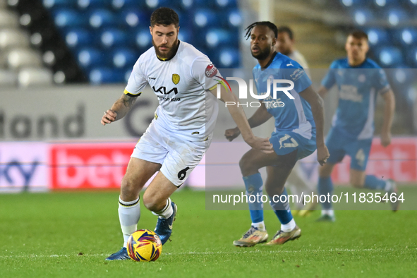 Ryan Sweeney (6 Burton Albion) controls the ball during the Sky Bet League 1 match between Peterborough United and Burton Albion at the West...