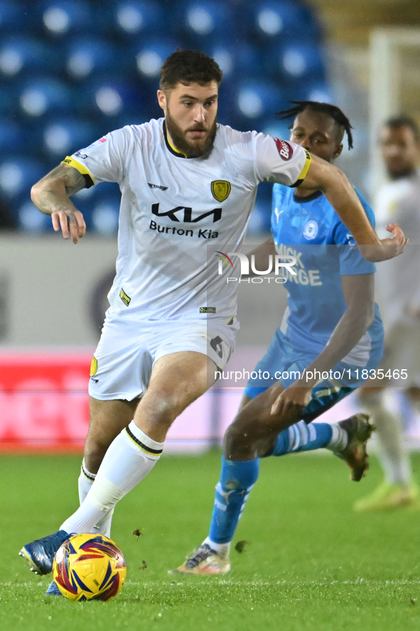 Ryan Sweeney (6 Burton Albion) goes forward during the Sky Bet League 1 match between Peterborough United and Burton Albion at the Weston Ho...