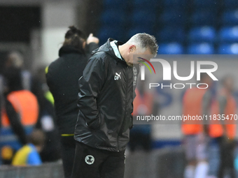 Manager Darren Ferguson looks down during the Sky Bet League 1 match between Peterborough United and Burton Albion at the Weston Homes Stadi...