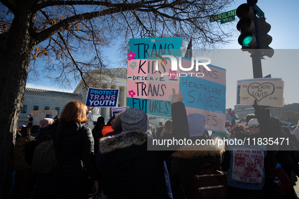 Demonstrators support gender-affirming care for transgender children outside the Supreme Court in Washington, DC, on December 4, 2024.  The...