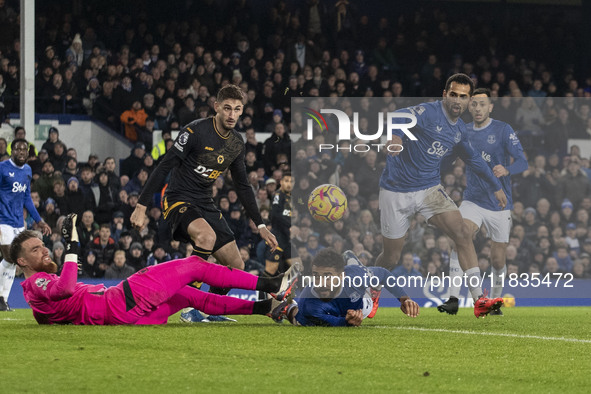 Iliman Ndiaye, number 10 of Everton F.C., takes a shot at goal during the Premier League match between Everton and Wolverhampton Wanderers a...