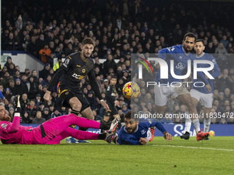 Iliman Ndiaye, number 10 of Everton F.C., takes a shot at goal during the Premier League match between Everton and Wolverhampton Wanderers a...