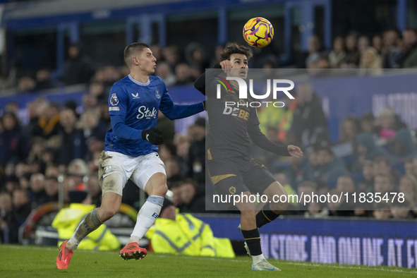 Vitaliy Mykolenko #19 of Everton F.C. challenges the opponent during the Premier League match between Everton and Wolverhampton Wanderers at...