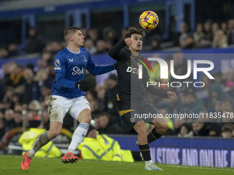 Vitaliy Mykolenko #19 of Everton F.C. challenges the opponent during the Premier League match between Everton and Wolverhampton Wanderers at...