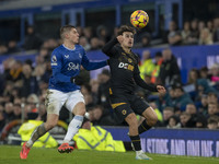 Vitaliy Mykolenko #19 of Everton F.C. challenges the opponent during the Premier League match between Everton and Wolverhampton Wanderers at...