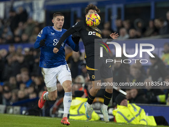 Vitaliy Mykolenko #19 of Everton F.C. challenges the opponent during the Premier League match between Everton and Wolverhampton Wanderers at...