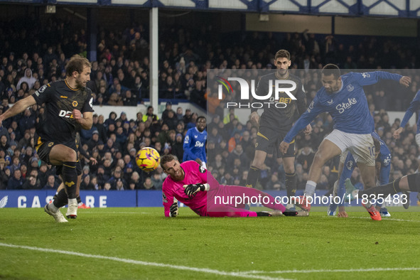 Iliman Ndiaye, number 10 of Everton F.C., takes a shot at goal during the Premier League match between Everton and Wolverhampton Wanderers a...