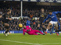 Iliman Ndiaye, number 10 of Everton F.C., takes a shot at goal during the Premier League match between Everton and Wolverhampton Wanderers a...