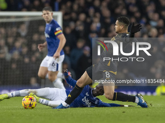 Joao Gomes #8 of Wolverhampton Wanderers F.C. stretches for the ball during the Premier League match between Everton and Wolverhampton Wande...