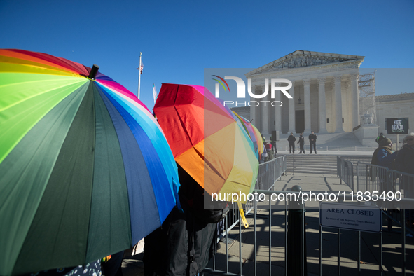 Supreme Court Police watch competing demonstrations over gender-affirming care for transgender children in Washington, DC, on December 4, 20...