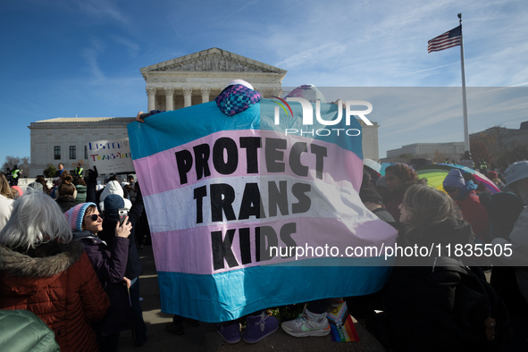 People demonstrate for gender-affirming care for transgender children in Washington, DC, on December 4, 2024.  The Court is hearing oral arg...