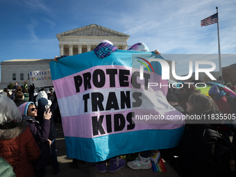 People demonstrate for gender-affirming care for transgender children in Washington, DC, on December 4, 2024.  The Court is hearing oral arg...