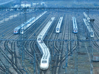 In Nanjing, China, on December 5, 2024, a photo shows EMU trains at Nanjing Bullet Train Station in East China's Jiangsu province. (