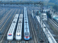 In Nanjing, China, on December 5, 2024, a photo shows EMU trains at Nanjing Bullet Train Station in East China's Jiangsu province. (