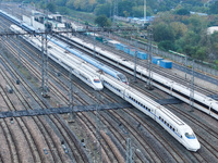 In Nanjing, China, on December 5, 2024, a photo shows EMU trains at Nanjing Bullet Train Station in East China's Jiangsu province. (