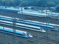 In Nanjing, China, on December 5, 2024, a photo shows EMU trains at Nanjing Bullet Train Station in East China's Jiangsu province. (