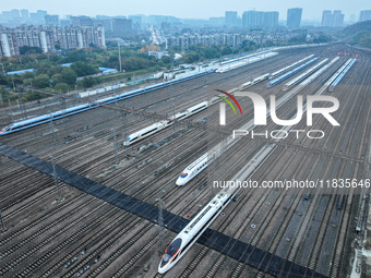 In Nanjing, China, on December 5, 2024, a photo shows EMU trains at Nanjing Bullet Train Station in East China's Jiangsu province. (