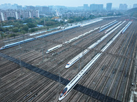 In Nanjing, China, on December 5, 2024, a photo shows EMU trains at Nanjing Bullet Train Station in East China's Jiangsu province. (