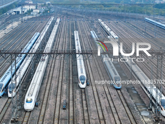 In Nanjing, China, on December 5, 2024, a photo shows EMU trains at Nanjing Bullet Train Station in East China's Jiangsu province. (