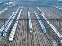 In Nanjing, China, on December 5, 2024, a photo shows EMU trains at Nanjing Bullet Train Station in East China's Jiangsu province. (