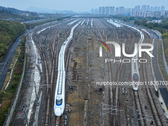 In Nanjing, China, on December 5, 2024, a photo shows EMU trains at Nanjing Bullet Train Station in East China's Jiangsu province. (