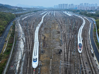 In Nanjing, China, on December 5, 2024, a photo shows EMU trains at Nanjing Bullet Train Station in East China's Jiangsu province. (