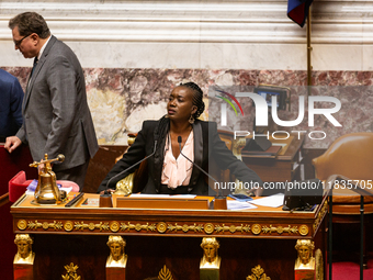 Nadege Abomangoli, deputy of La France Insoumise, presides over the session for the examination of the report of the 2024 end-of-year financ...