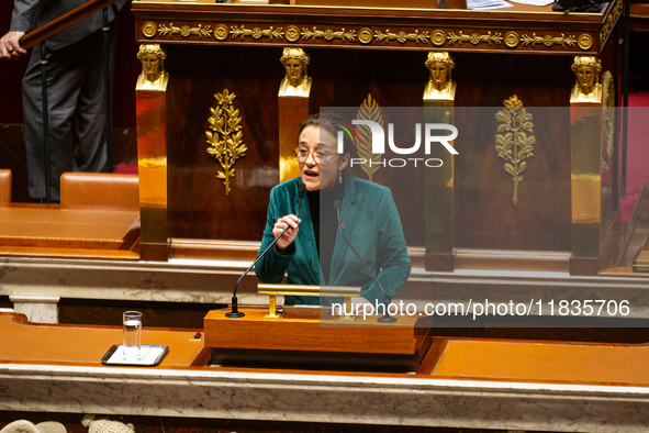 Mathilde Feld, deputy of the La France Insoumise group, speaks during the session examining the report of the 2024 end-of-year finance bill...