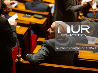 Roland Lescure, deputy of the Ensemble pour la Republique group, is seen during the session of examination of the report of the 2024 end-of-...