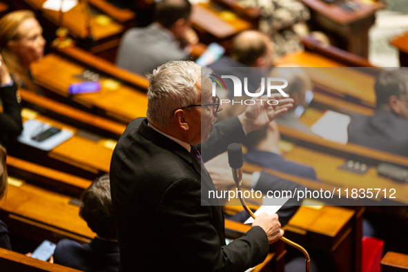 Jean-Rene Cazeneuve, deputy of the Ensemble pour la Republique group, speaks during the session of examination of the report of the 2024 end...