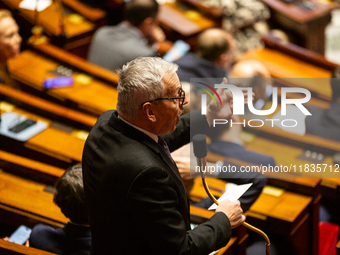 Jean-Rene Cazeneuve, deputy of the Ensemble pour la Republique group, speaks during the session of examination of the report of the 2024 end...