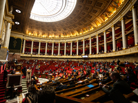 A general view of the hemicycle of the National Assembly during the session for examining the report of the 2024 end-of-year finance bill ta...