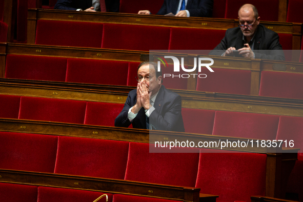 Francois Hollande, deputy of the Socialistes et Apparentes group, is seen during the session of examination of the report of the 2024 end-of...