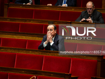 Francois Hollande, deputy of the Socialistes et Apparentes group, is seen during the session of examination of the report of the 2024 end-of...